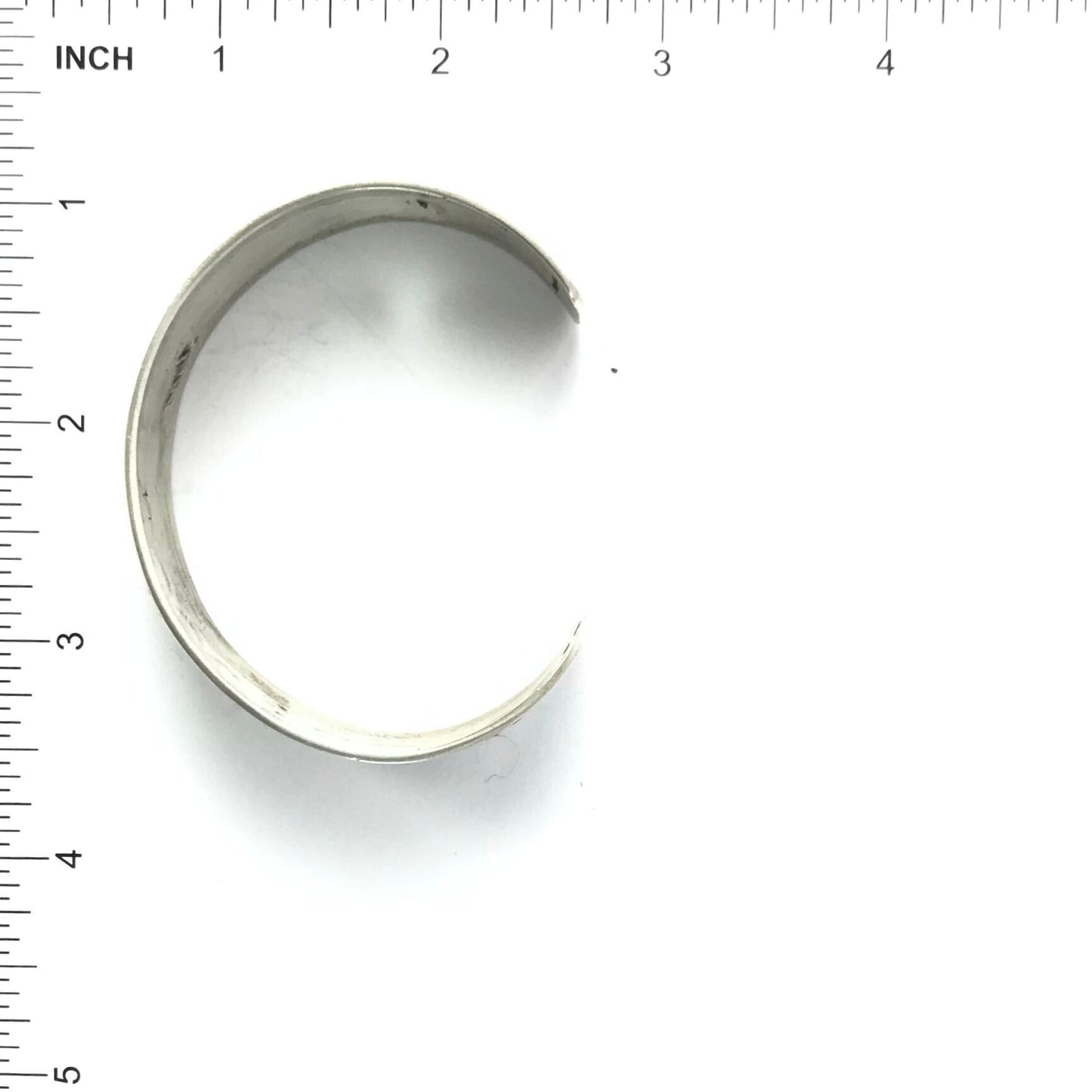 Tony Chino Stamped Sterling Silver Bracelet-Indian Pueblo Store